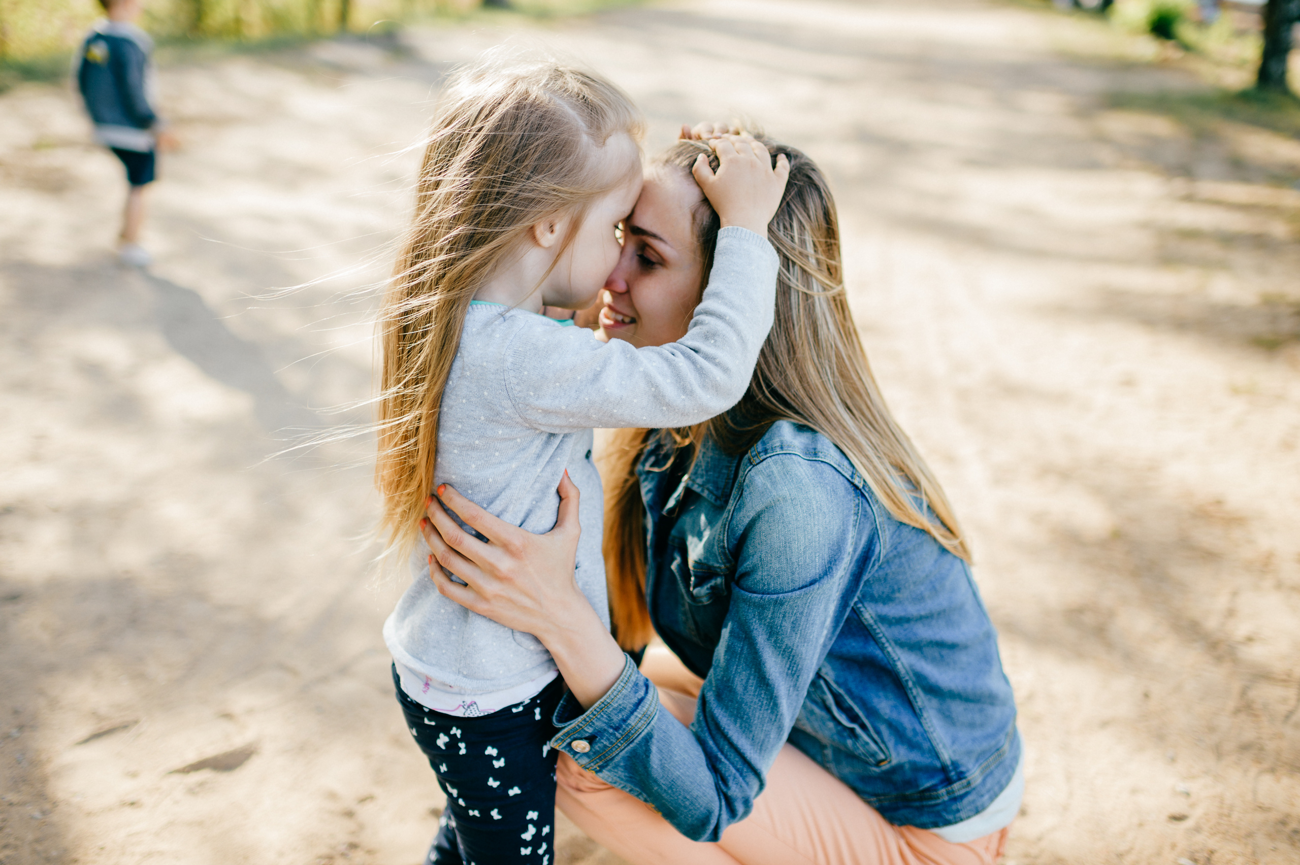 Mother hugging her child
